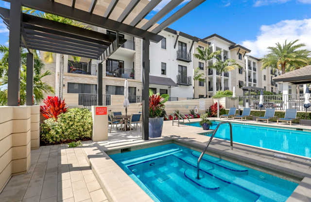 Luxury Living Meets Prime Location! Naples Square 2/2 Condo with Expansive Terrace Gallery 1