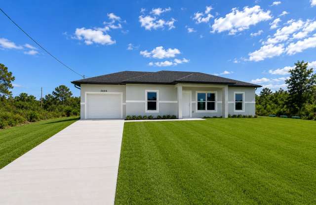 NEW CONSTRUCTION- Modern 3 Bed / 2 Bath Home in Lehigh Acres Gallery 1