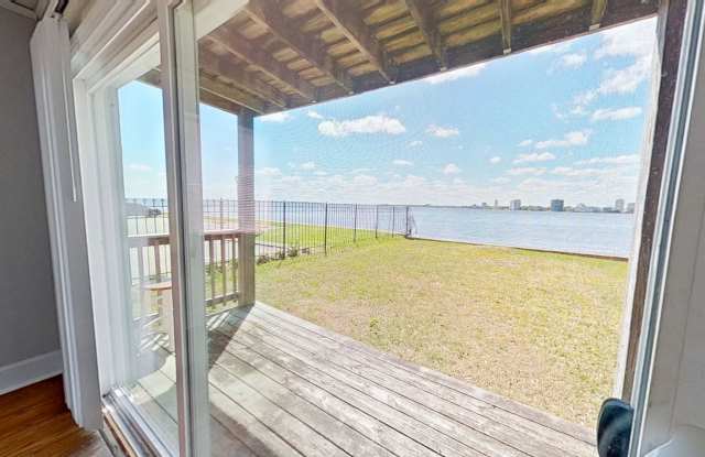 Riverfront Living! First Floor Unit w/ Private Patio, Stunning Views & Upgraded Kitchen photos photos