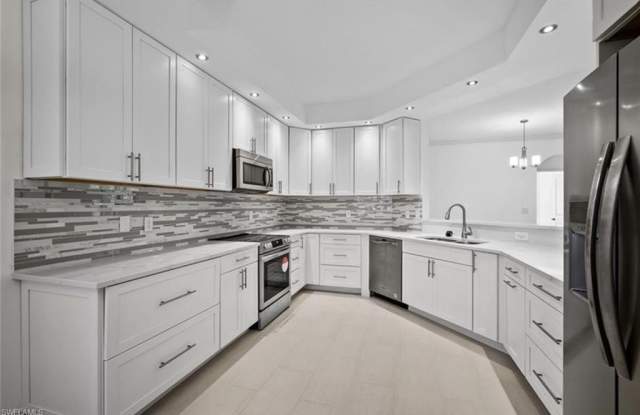 7056 Pelican Bay Blvd unit: B102 photos photos