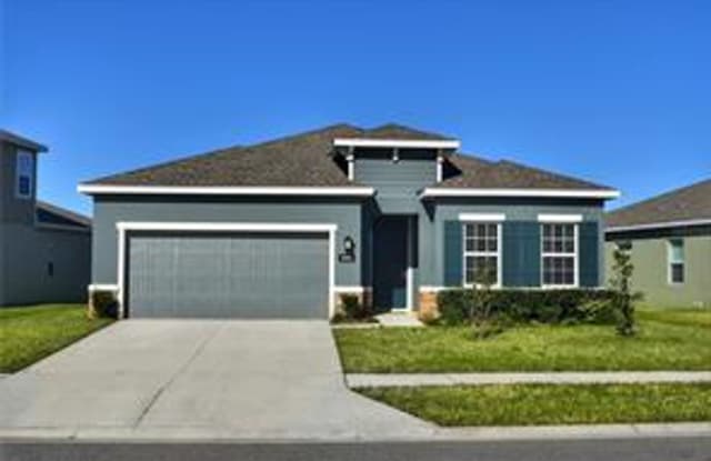 Open concept home offering four bedrooms, three baths, a two car garage and open lanai. photos photos