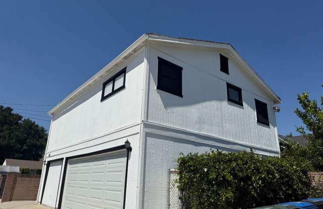 Large renovated Stand alone one bedroom above garage photos photos