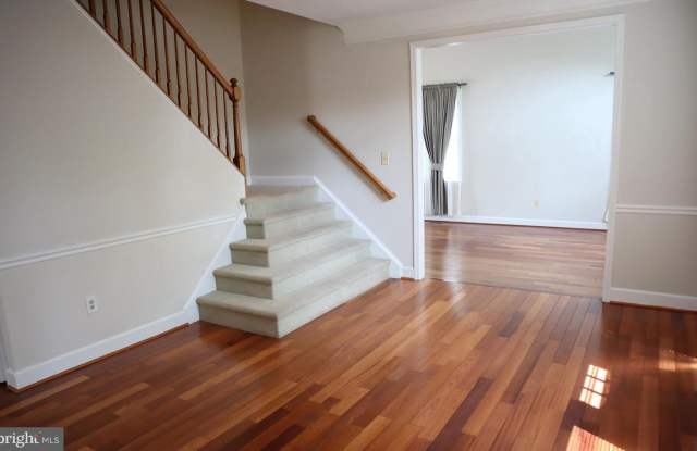 YOUR NEW HOME SEARCH IS OVER!! A Stately, 4-bedroom, 4-bathroom Colonial home with over $4,700 SF is available in Olney! Gallery 4