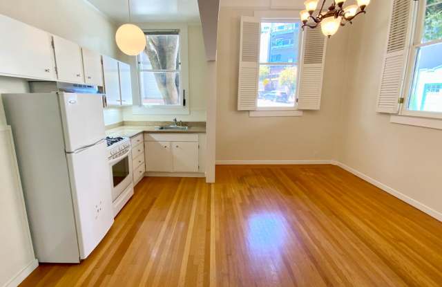 1BR W/ Large Private Basement Space! HARDWOOD! LAUNDRY ON-SITE! photos photos