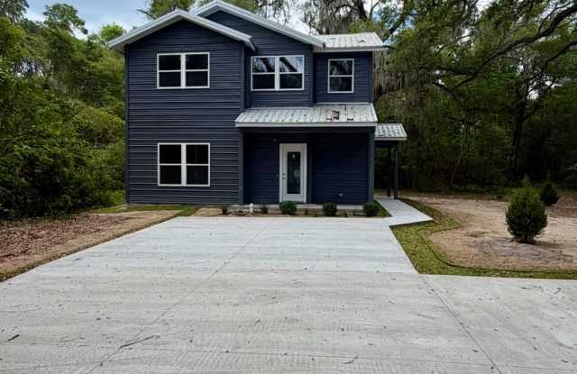 Stunning Brand-New 4BR / 4.5BA Home in Prime Gainesville Location photos photos