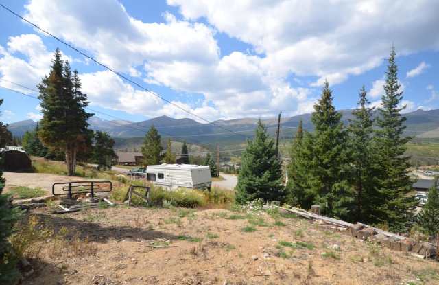 Garden level one bedroom apartment in the hills above BRECK.  Pets OK!  Includes HEAT and electric!  One Car Space in the Garage! Gallery 3