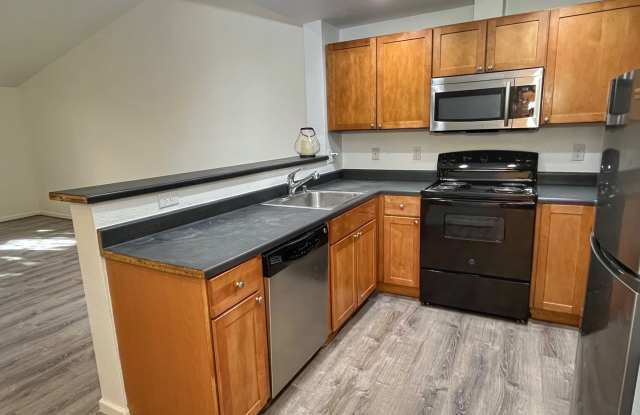 East Hill 2-bedroom top-floor unit w/s/g included photos photos