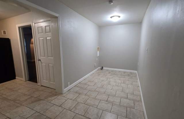 $400 OFF First Month!  3-Bedroom, 1.5 Bath Single Family for Rent in Raytown, MO | Attached Garage & Modern Kitchen Gallery 3