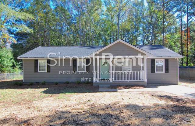 JUST REDUCED! 4 Bdrm / 2 Bath Home - 1st month's rent free w/ 13 month lease! - 8178 Tudor Drive, Clayton County, GA 30238