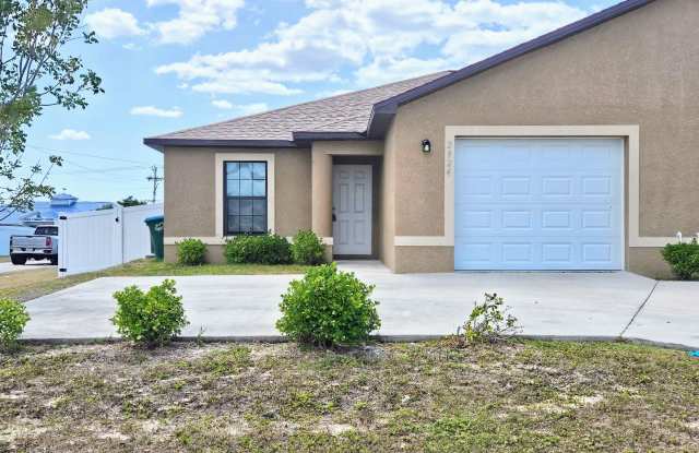 Stunning 3 Bed / 2 Bath Duplex w/ Garage – Pet-Friendly Fenced-in Corner Lot! - 2924 Southwest 7th Place, Cape Coral, FL 33914 Stunning 3 Bed / 2 Bath Duplex w/ Garage – Pet-Friendly Fenced-in Corner Lot! - 2924 Southwest 7th Place, Cape Coral, FL 33914