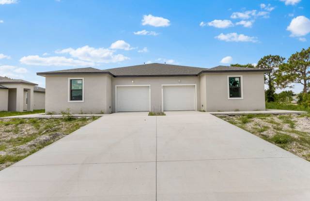 1137 Harvest Ave - 1137 Harvest Avenue, Lehigh Acres, FL 33974