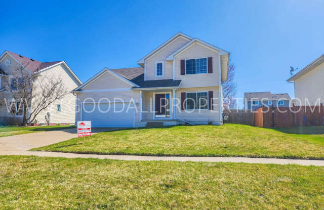 Rent Reduced!!! 3 bedroom home with fenced in backyard in desirable Waukee neighborhood! photos photos