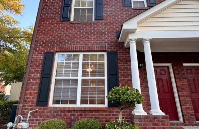 Two story all brick quad style townhouse within a great community! Gallery 1