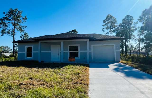 ONE OF A KIND! BRAND NEW 1 Bedroom-1 Bath- 1 Car Garage in Desirable Lehigh Acres! photos photos