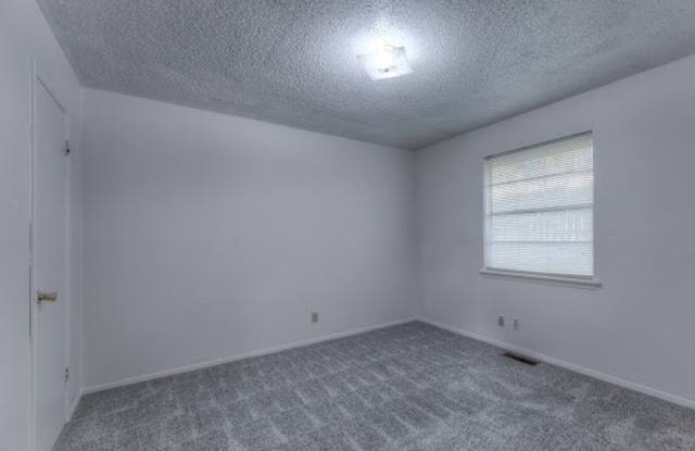 Updated 2 Bedroom Duplex with Attached Garage, Covered Patio & Move-In Ready! Gallery 3