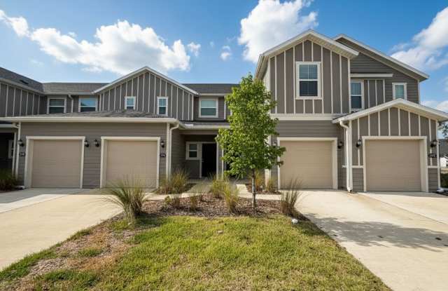 Modern 3 Bed 2.5 Bath Townhome with Attached Garage, Patio and Lawn Care Included! Move in Ready! - 11792 Junegrass Rd, Jacksonville, FL 32258