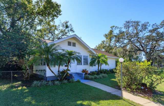 Run don't walk for this one of a kind beautifully maintained Old Florida Charmer on a park like double lot! photos photos