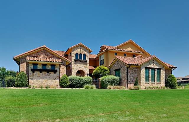 Experience Resort-Style Living in the Prestigious Gated Community of Bella Flora. photos photos
