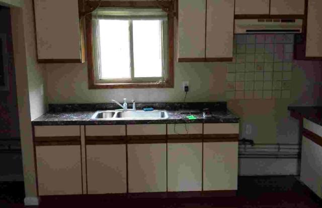 Three bedroom ranch with 2 car garage and large fenced in yard photos photos