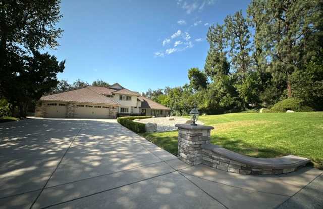 North Ranch Tudor on a half‑acre oasis — 4 bed, 3.5 bath, 3500 sq ft with a chef’s kitchen, luxe master suite and resort backyard (pool, spa, sport court, putting area). Impeccably maintained — a must‑see. Gallery 1
