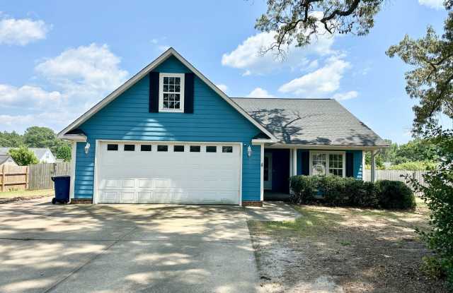 Country Living Feel in this 4 Bedroom, 2 Bath Home on a Large lot. photos photos