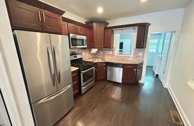 Spacious 3-Bedroom Home with Central Air, In-Unit Laundry and Patio Gallery 3