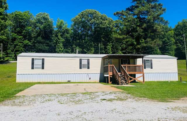 Welcome home! Great location!  3 bed, 2 bath, large kitchen, parking for 2, lots of green space, W/D hookups, must see! photos photos