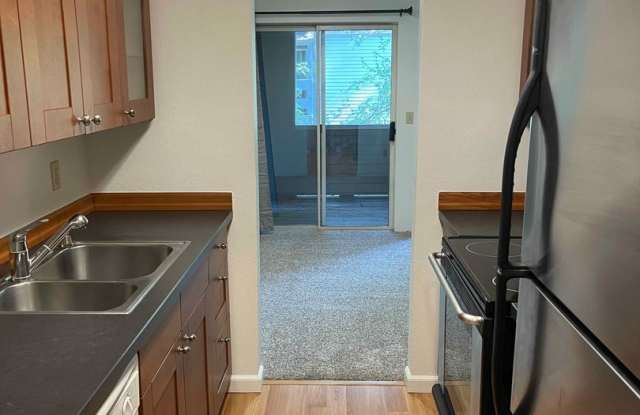 Bright and Airy One Bedroom Condo - Water, Sewer  Trash Covered! - $300 off first month's rent! photos photos