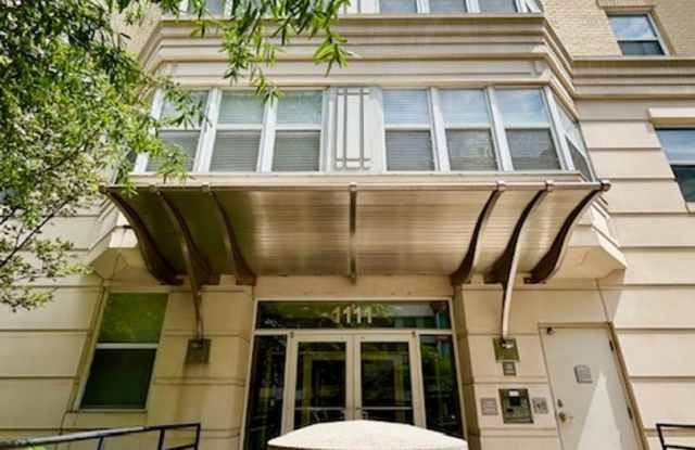 Welcome to this 2BD/2BA home at The Eleven with a BALCONY - GARAGE PARKING - 1 STORAGE UNIT! photos photos