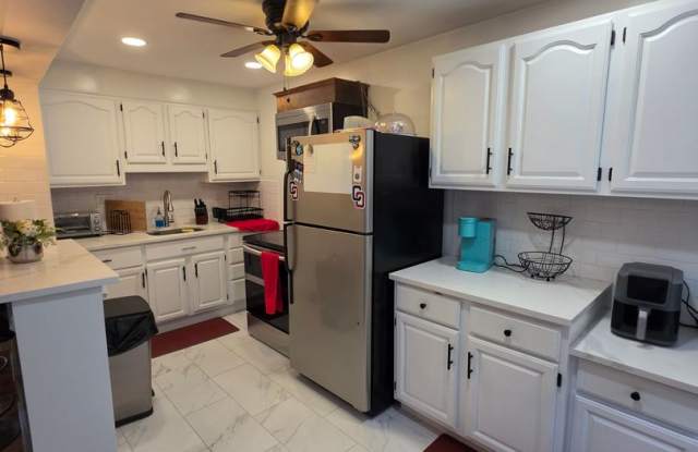 Spacious 3-Bedroom, 2-Bath Home with Finished Basement, Parking & Central Air Gallery 3