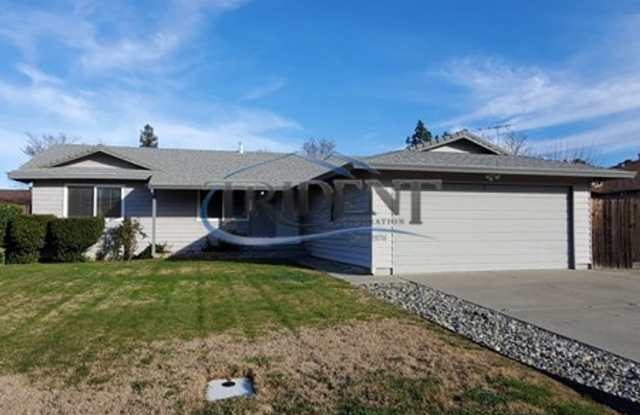 This is a cute 4 bedroom, 2 bath house in an established Woodland community photos photos