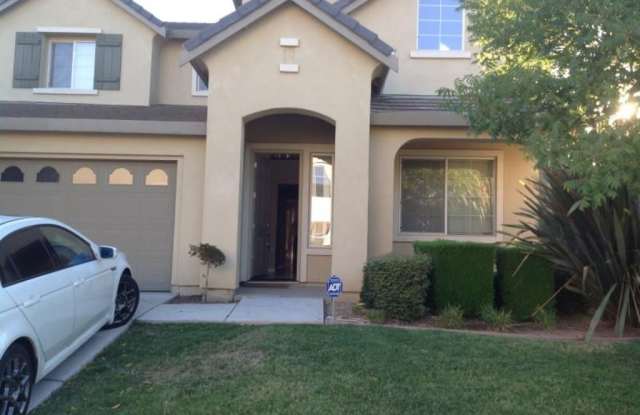 Located in a great neighborhood 5Bdm 3Ba Home With 2 Car Garage photos photos