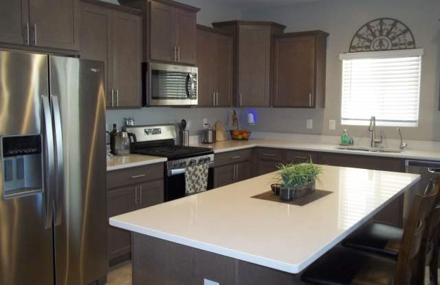 Stunning Fully furnished home 3 bed 2.5 baths 2056 sq ft w/heated pool!!! Must see will rent fast! Gallery 3