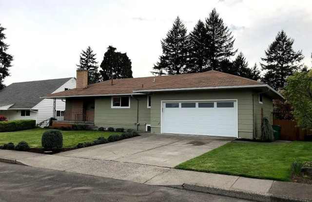 Spacious 4 Bedroom Home with Granite Kitchen, Main-Level Primary Suite, Two Living Areas & Outdoor Patio Gallery 4
