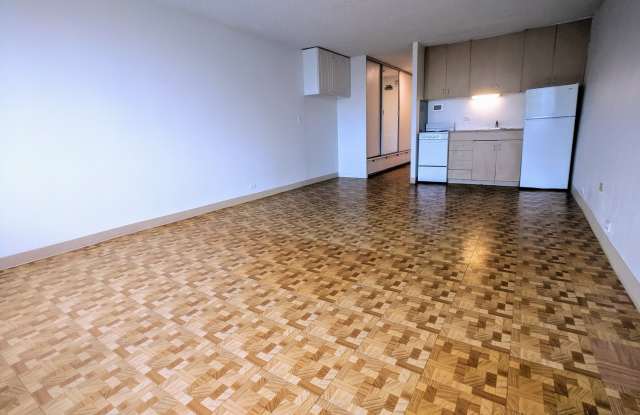 Spacious partly furnished Studio with electric/water utilities and no parking at Pacific Grand photos photos