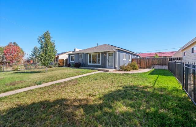 Spacious 5-Bedroom Denver Home | Finished Basement + Garage + Backyard Gallery 1