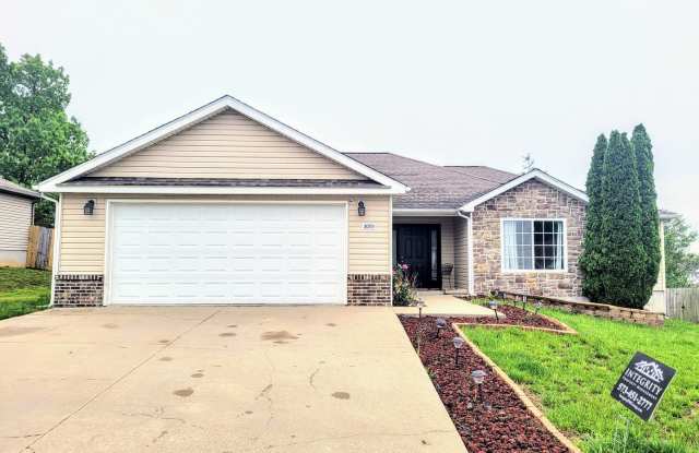 1 story home with a fence Gallery 1