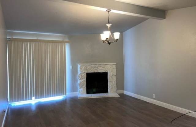 Laminate flooring throughout. Solar panels. Low maintenance yard. Gallery 4