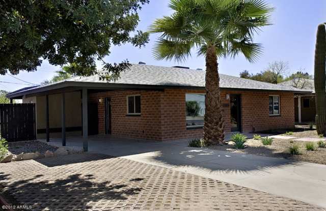 Remodeled Central Phoenix Charmer!! Cement Floors, Updated Kitchen, Old School Feel with Urban touches!!! Landscaping Included!!! photos photos