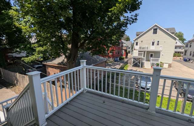 Spacious Townhouse: 4-bed, 3.5 bath unit in Brighton with Garage Parking photos photos