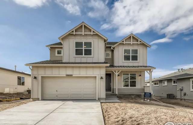 stunning two-story home with open-concept great room boasts floor-to-ceiling windows designed to maximize natural light and scenery photos photos