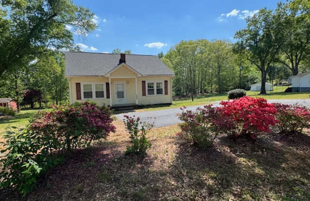 SPECIAL FOR MAY-When approved, 1/2 Security Deposit-Cute Bungalow-2BR/1BA home in a great location - Right off of Hwy 101 & Milford Church Rd, Greer. Fresh New Paint, Gorgeous Hardwood Floors, & Newly updated Bathroom!! Move In Ready photos photos