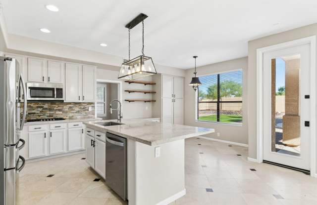 Completely updated with a POOL spacious Tatum Ridge home with 4 Bedrooms, 3 bathroom plus an office, 3 car garage, Huge Yard with Salt Water pool and all Appliances!! Available NOW!! Gallery 3