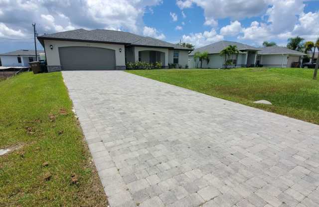 Coming Soon! 4 Bedroom 2 Bath Annual Rental in NW Cape! photos photos