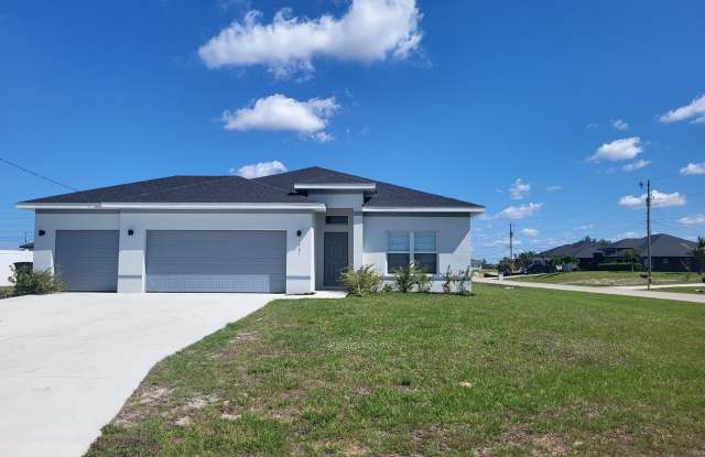 Like-New 4-Bedroom Home with 3-Car Garage in Prime Cape Coral Location! photos photos