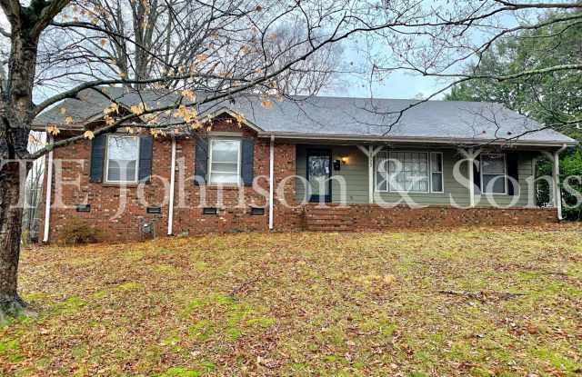 Spacious One Level Home with Den, Granite Kitchen Island, and 2 Car Carport photos photos