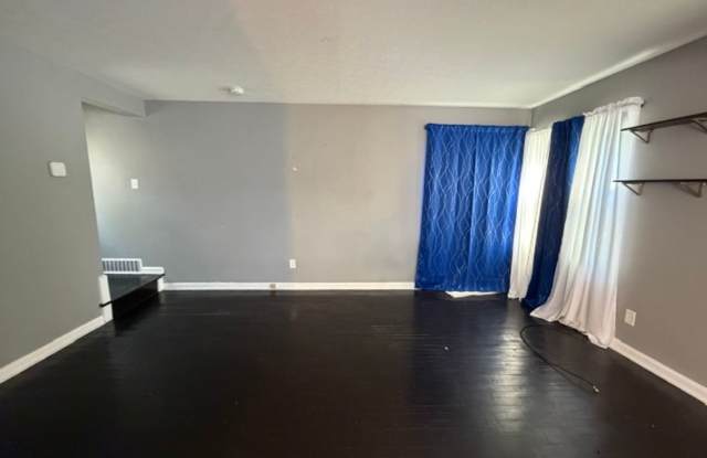 Updated 3BR Home with Open-Concept Kitchen, Bonus Lower-Level Bedroom & Garage Gallery 3