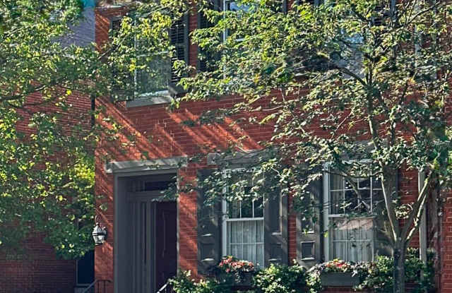 COMING SOON! Gorgeous historic downtown Carlisle rental with fenced yard, pond, balcony, and hardwood floors photos photos