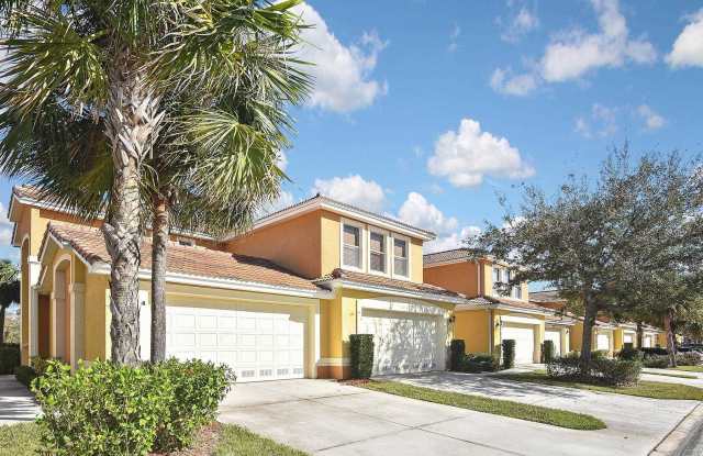 4BR/3BA Fort Myers Coach Home with Lake View & 2-Car Garage — $2,400/mo photos photos