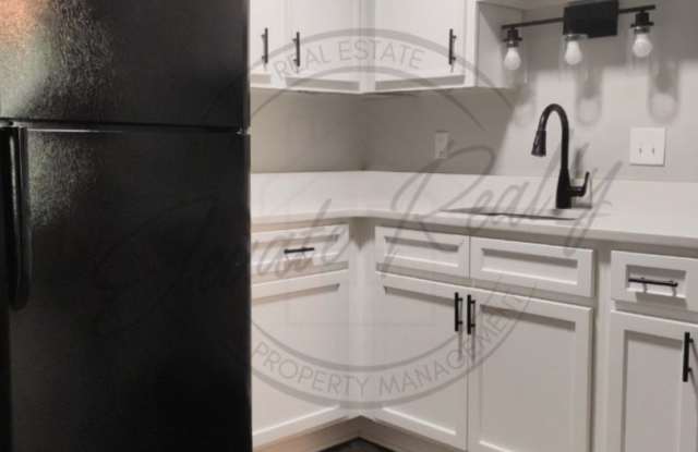 ONE MONTH FREE RENT: Second Floor One Bedroom Updated Apartment with Laundry Hook Ups! Gallery 4